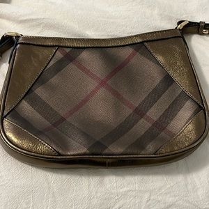 Authentic Burberry crossbody bag. Bronze metallic leather with gold hardware